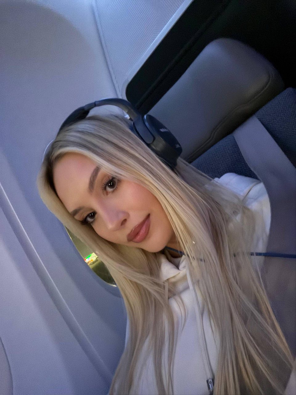 Client in her business class seat